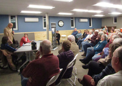 Ray Hunkins speaks at the well-attended book signing